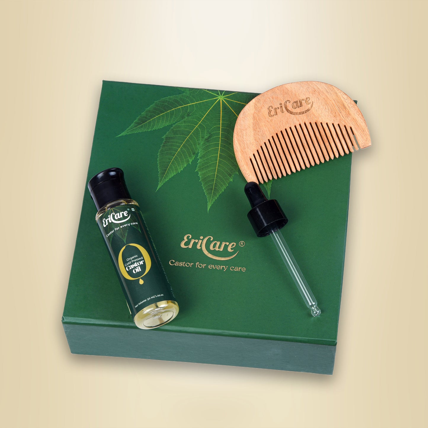Top view of hair care kit showing wooden comb, dropper and organic castor oil